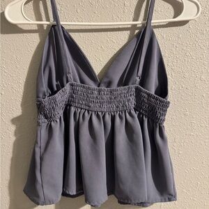 Grey flowy tank top with adjustable straps